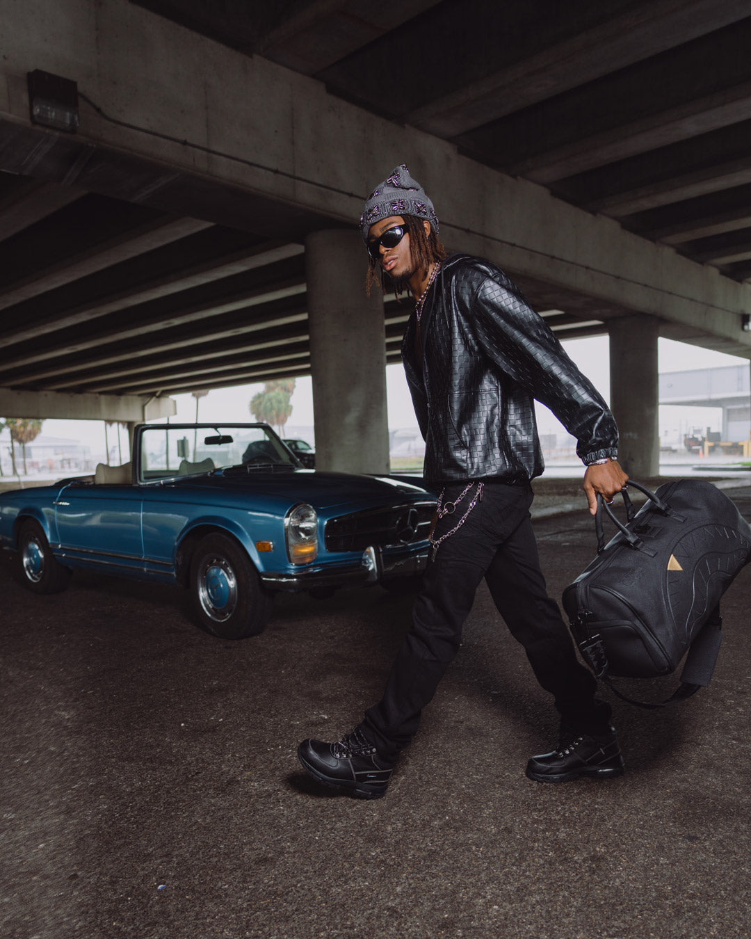 THE GOLDEN FANG SHARK DUFFLE