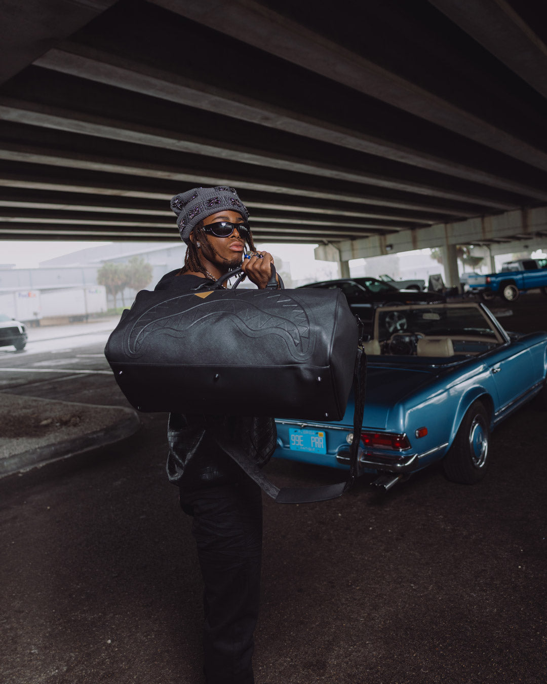 THE GOLDEN FANG SHARK DUFFLE