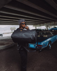 THE GOLDEN FANG SHARK DUFFLE