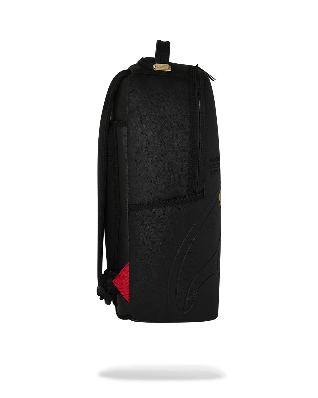 THE GOLDEN FANG SHARK BACKPACK